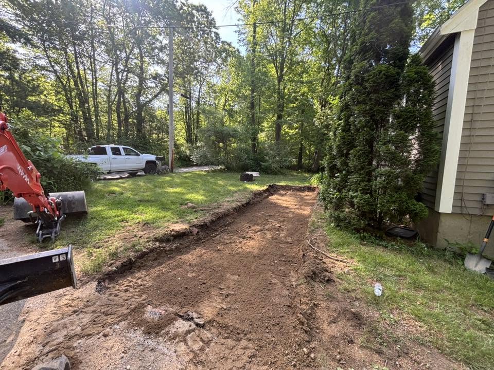 Walkway excavation complete — ready for gravel base and pavers